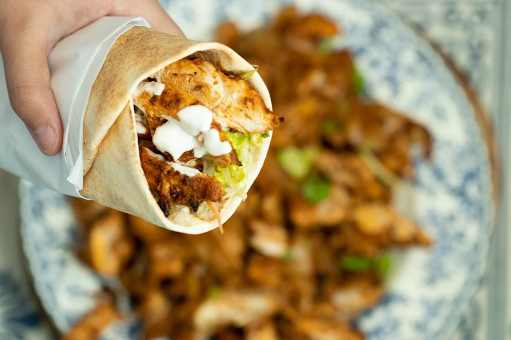 famous shawarma roll with garlic sauce in hyderabad